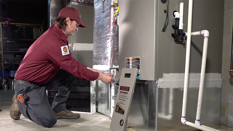 Technician working with unit