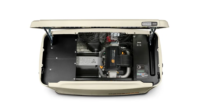 Open Generac Guardian 26kW standby generator showing internal engine components on a white background